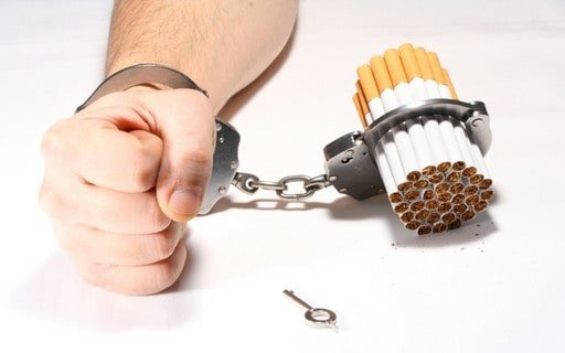 Cigarettes handcuffed to hand